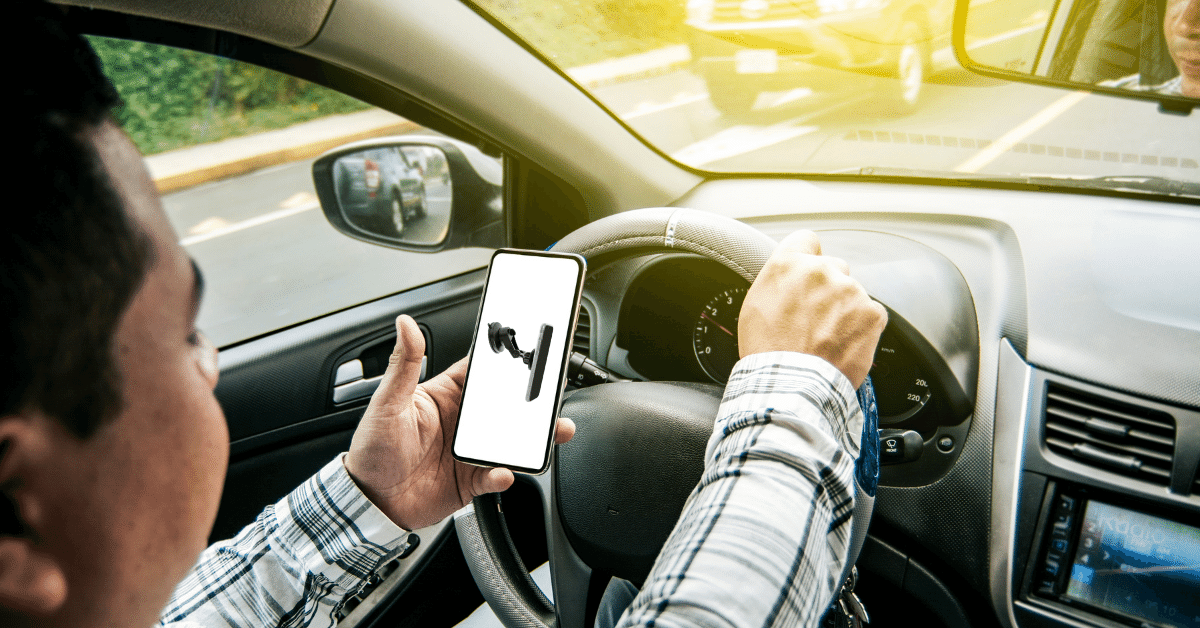 Holding Cell Phone in Car