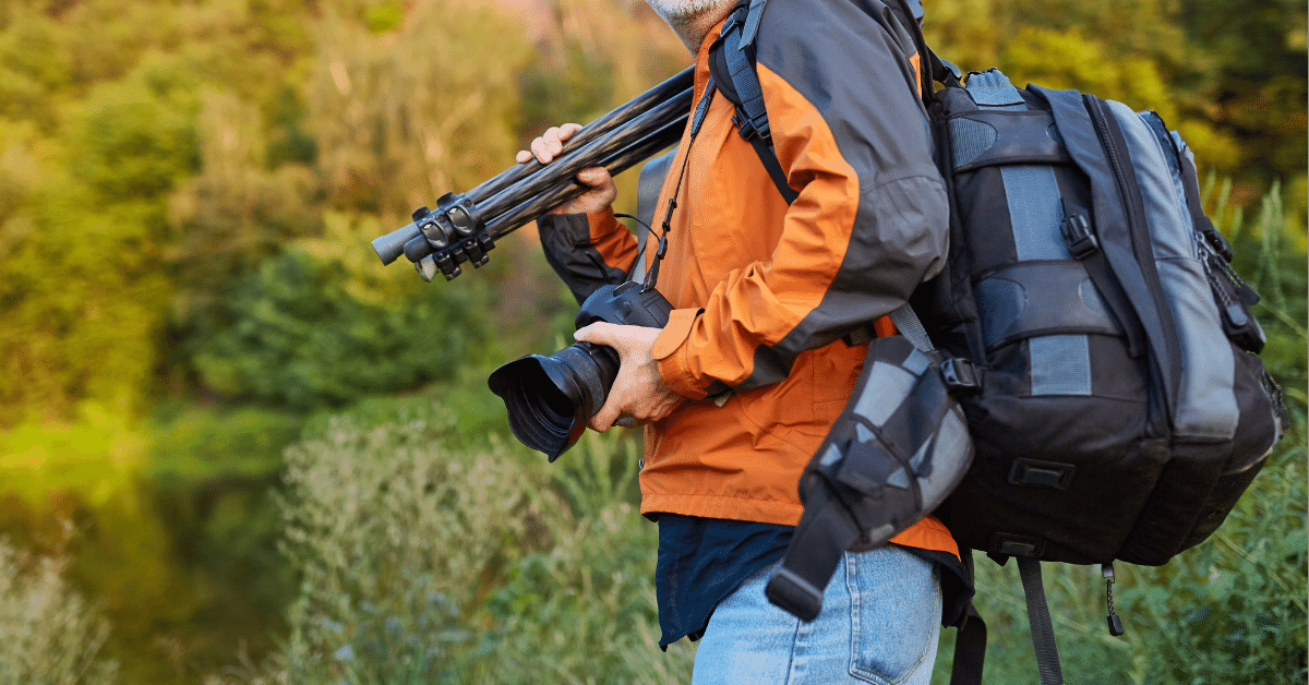 photographer with camera and backpack